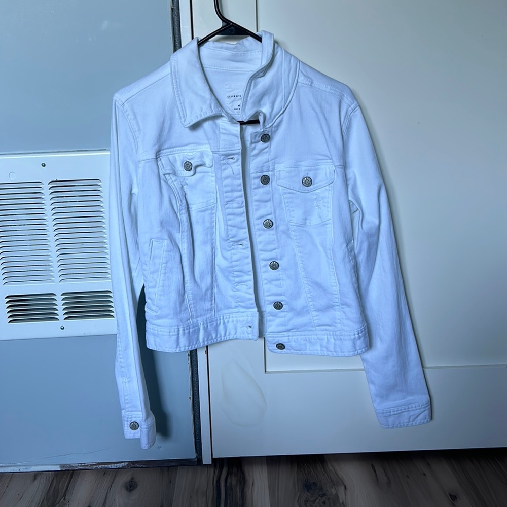 White lightly distressed denim jacket